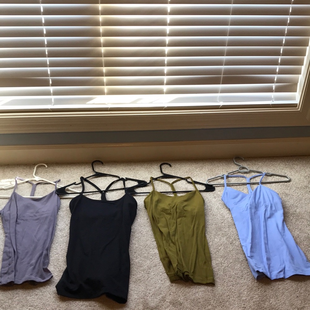 Variety of lululemon Power Y tanks. Vary in sizes 4-8.